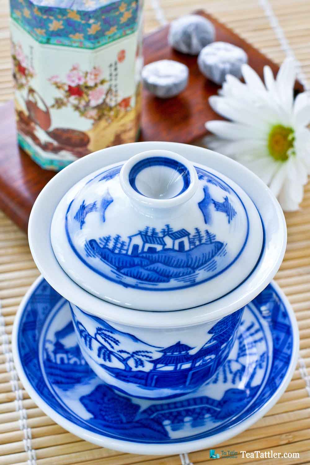 Blue and White Gaiwan with a pattern similar to the Spode Blue Willow pattern. It has a porcelain filter insert suitable for loose leave tea. | TeaTattler.com #gaiwan #liddedbowl