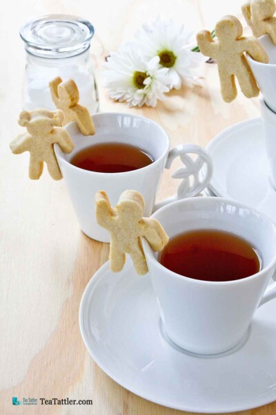 These fun and tasty Cup-Adorning Lemon Cookies are able to cling to the side of your teacup or mug. A delight for all occasions. | TeaTattler.com #cupadorninglemoncookies #lemoncookies