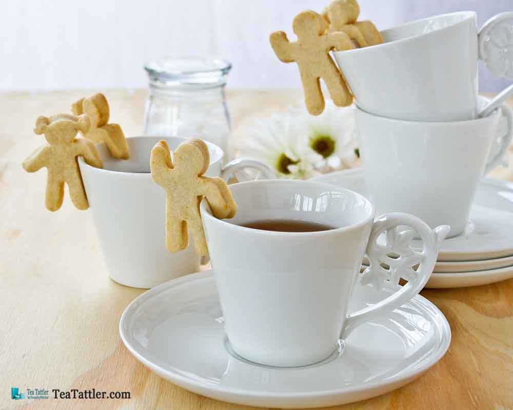 These fun and tasty Cup-Adorning Lemon Cookies are able to cling to the side of your teacup or mug. A delight for all occasions. | TeaTattler.com #cupadorninglemoncookies #lemoncookies