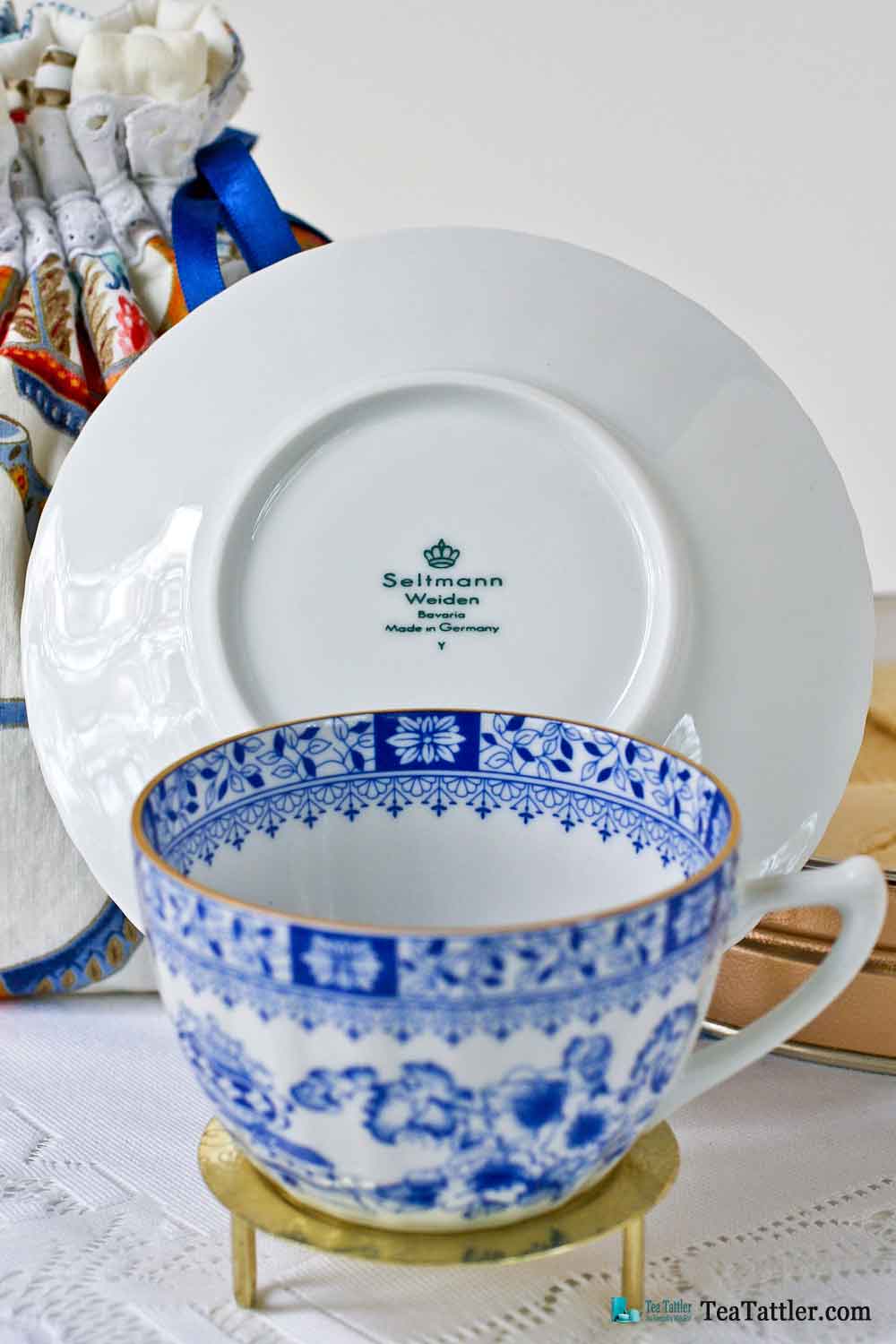 Markings on the saucer of this classic blue and white design adorned with floral and leaf motifs. | TeaTattler.com #dorotheachinablue #teacup