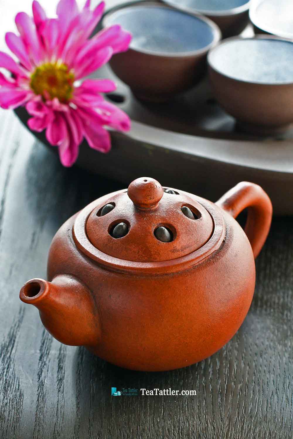 This Yixing Lotus Seed Teapot is made in the classic lotus seed design. The lid has six lotus seeds that move. Size is 4¾ inches by 2 inches. | TeaTattler.com #lotusseedteapot #yixingteapot