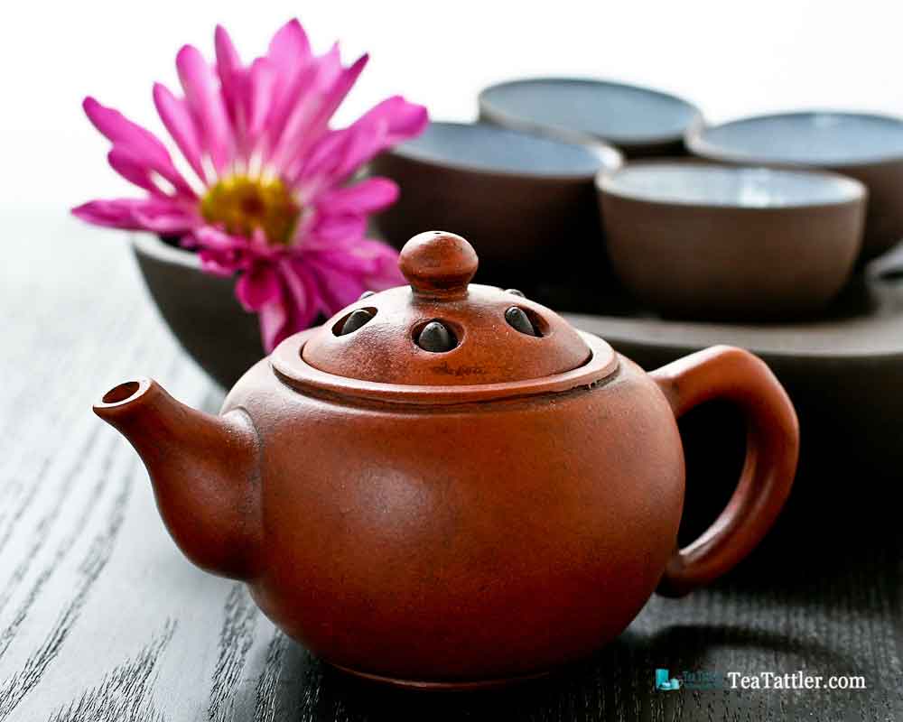 This Yixing Lotus Seed Teapot is made in the classic lotus seed design. The lid has six lotus seeds that move. Size is 4¾ inches by 2 inches. | TeaTattler.com #lotusseedteapot #yixingteapot