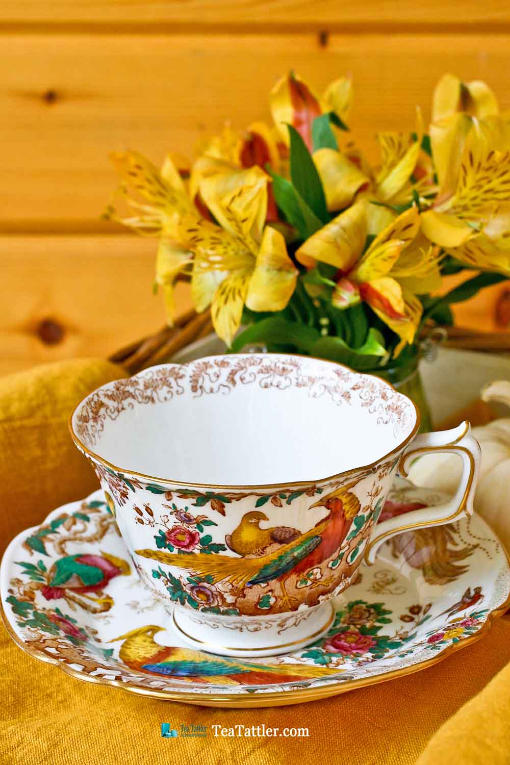 Olde Avesbury Teacup and Saucer with Colorful Birds of Paradise and Oriental Pheasants design taken from an original embroidery. | TeaTattler.com #oldeavesbury #teacup #royalcrownderby