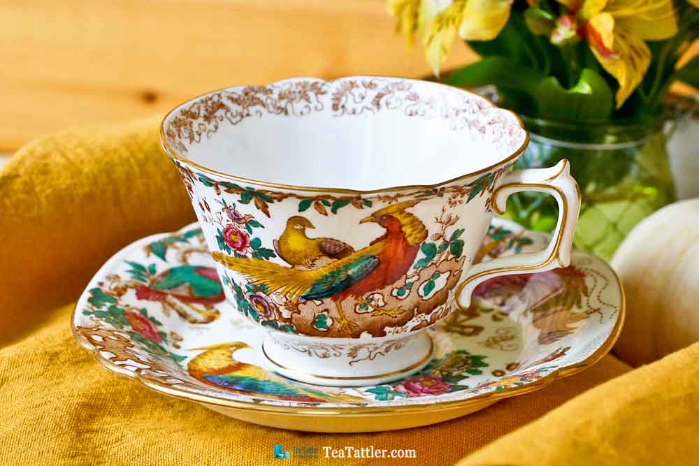 Olde Avesbury Teacup and Saucer with Colorful Birds of Paradise and Oriental Pheasants design taken from an original embroidery. | TeaTattler.com #oldeavesbury #teacup #royalcrownderby