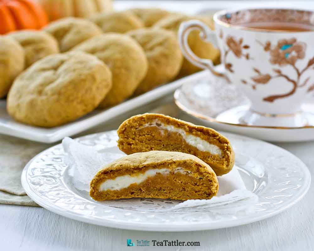 Pumpkin Cream Cheese Cookies - soft and chewy pumpkin flavored cookies with a cream cheese filling and a cake-like texture. | TeaTattler.com #pumpkincookies #creamcheesecookies #filledcookies