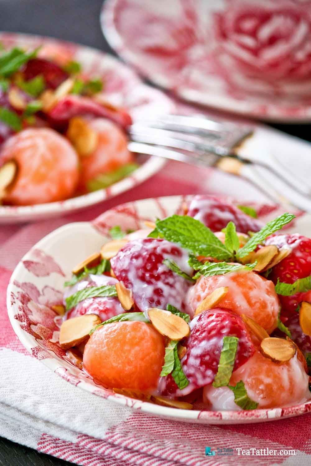 Cantaloupe Strawberry Salad - a cool and refreshing fruit salad using seasonal fruits perfect for a light meal or dessert. | TeaTattler.com #cantaloupestrawberrysalad #cantaloupesalad #strawberrysalad