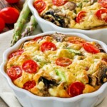 Easy Asparagus Mushroom Crustless Quiche with seasonal vegetables for Mother's Day or any day. Also a delicious brunch idea for the weekends. | TeaTattler.com #asparagusquiche #mushroomquiche #crustlessquiche