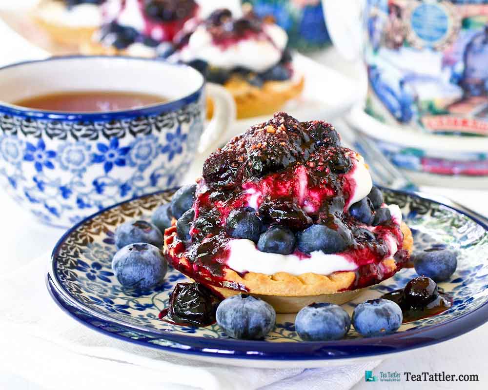 Easy to assemble Blueberry Cream Cheese Tarts using ready-to-fill tart shells. Only minutes to prepare toppings and sauce on stove top. | TeaTattler.com #blueberrytarts #readytofilltarts