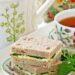 Dainty Egg and Watercress Sandwiches with hard cooked eggs and mayonnaise. Watercress provides a slightly peppery bite to the sandwiches. | TeaTattler.com #watercresseggsandwiches #eggsandwiches